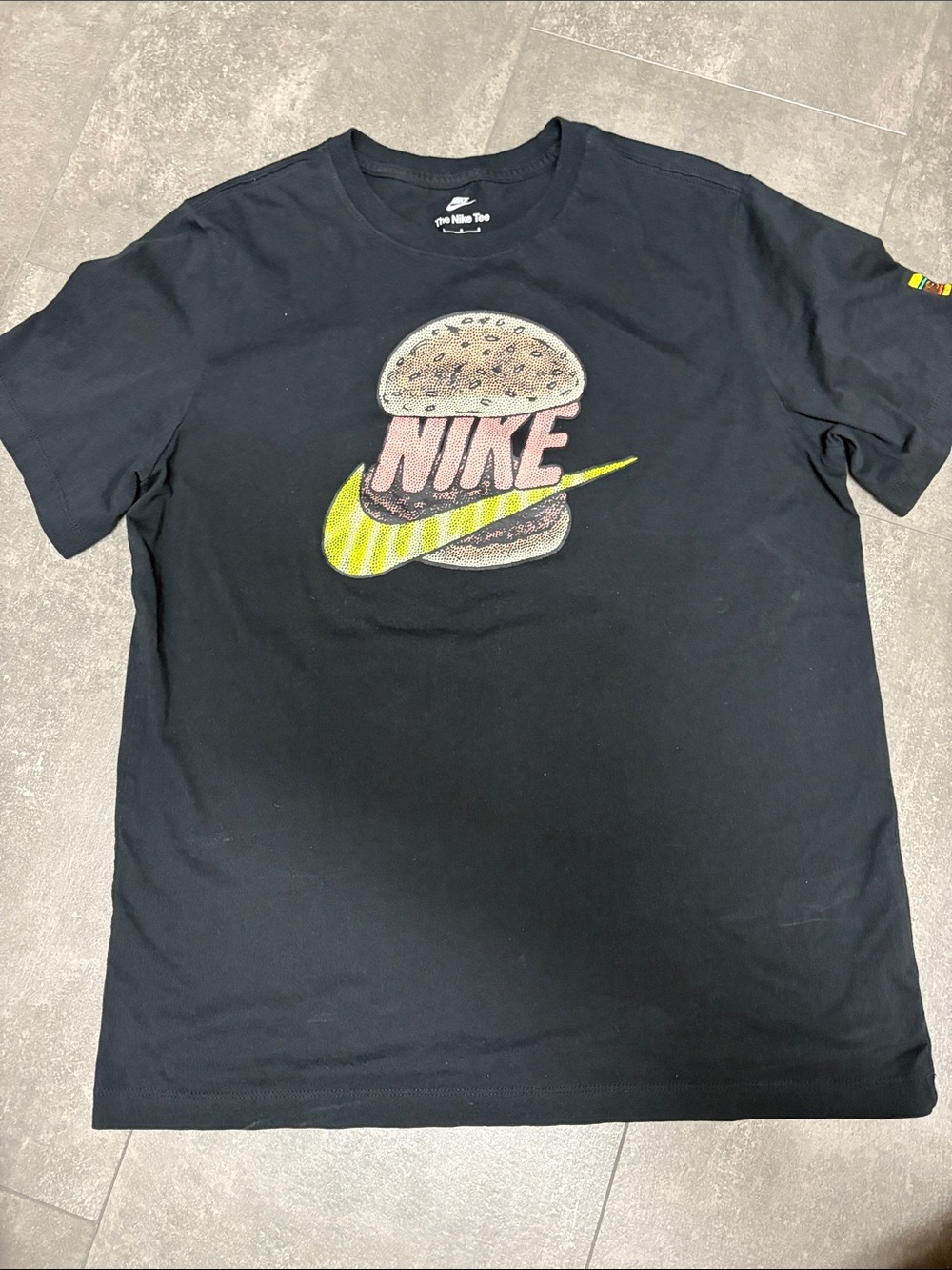 Nike Black Short Sleeve T-Shirt with Pink Logo and Yellow Swoosh